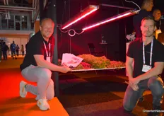 Rienk Hilgenkamp and Ronald van de Oudeweetering at the new Dimlux VertiLED fixture that uses hybrid cooling, making it possible to cool the lamps with either water or air. The lamp is also equipped with its own patented lens, allowing asymmetrical illumination.